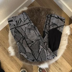 Lululemon capri leggings with side pockets and zipper in the back. Lightly used